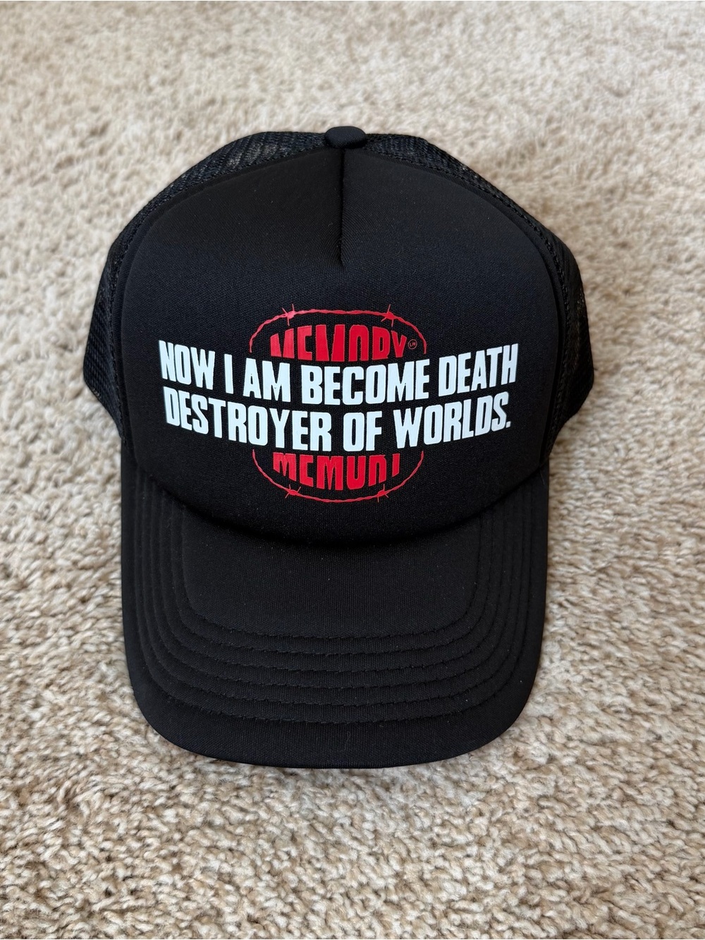Black Graphic Trucker Hat with White Slogan and Red Accent